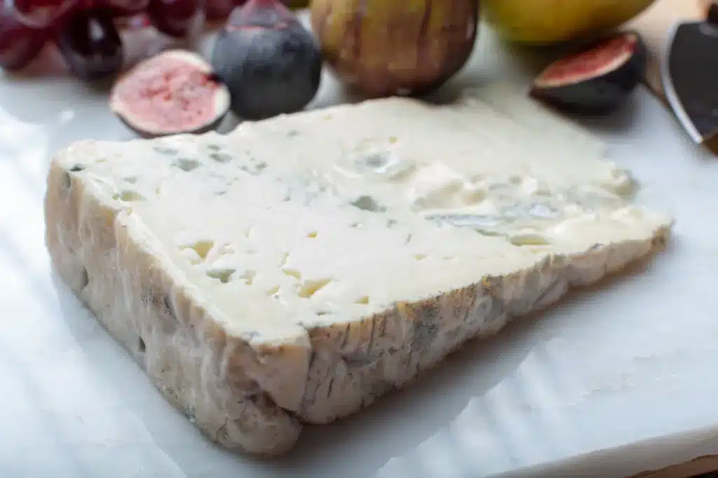 Gorgonzola dolce Italian blue cheese, made from unskimmed cow's milk in North of Italy served with fresh figs and pears