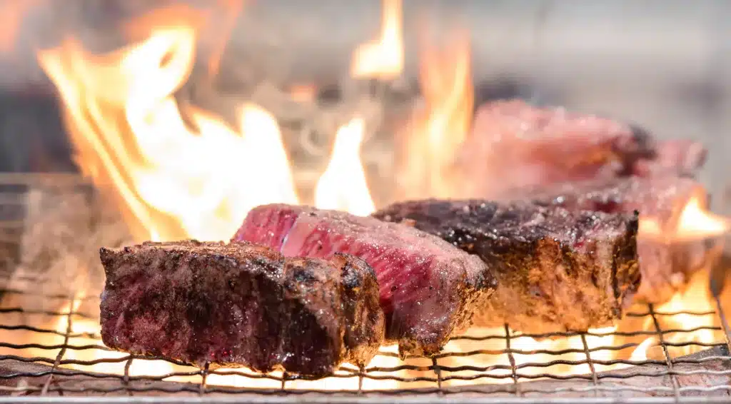 Miyazaki Beef Steak on the Grill with Flames.